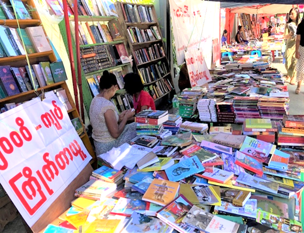 Collecting Myanmar-language Materials at a Street Book Market in Yangon, Myanmar (2019)